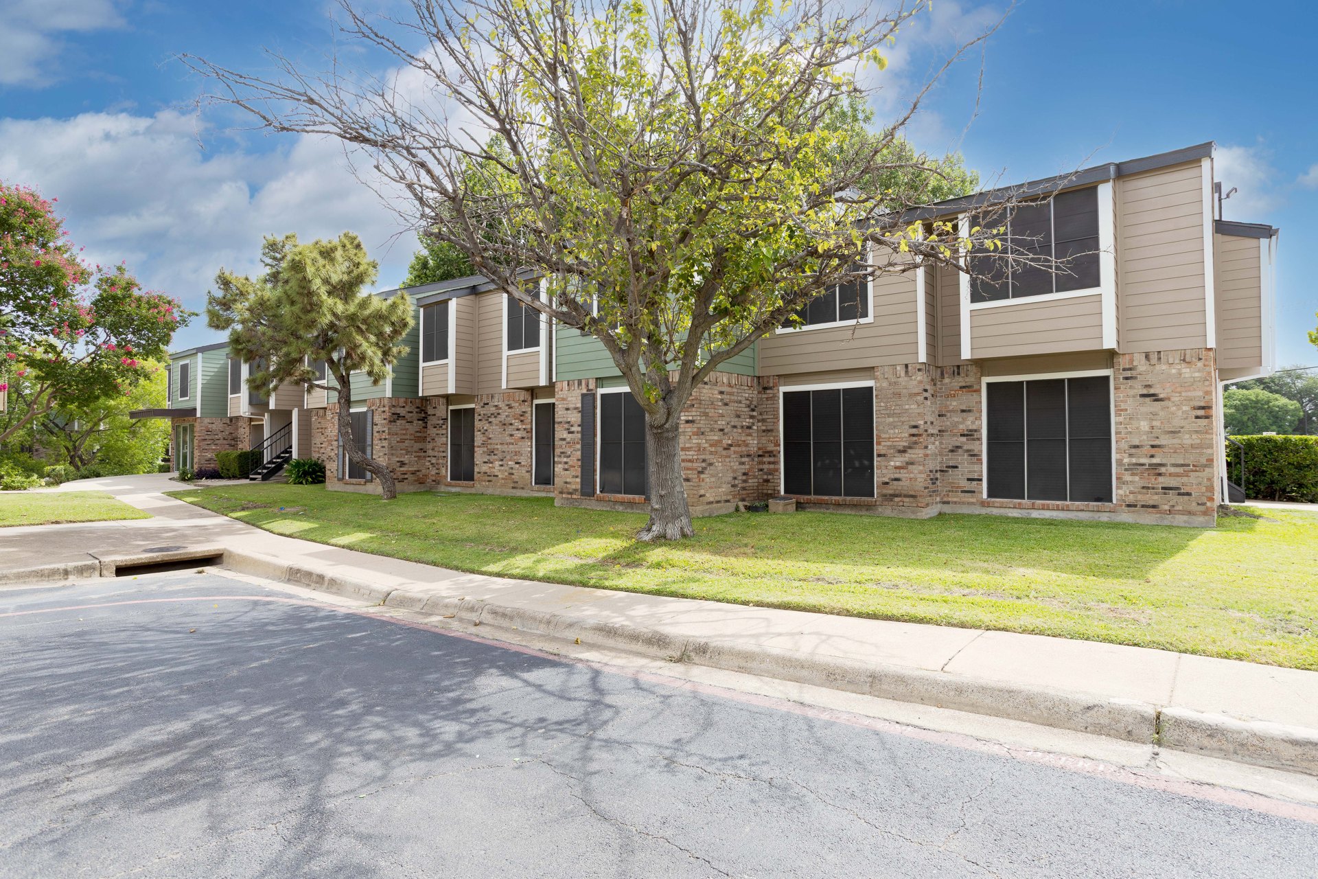 Renovated Josey Place buildings with landscaped grounds
